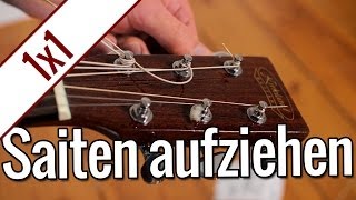 Gitarrensaiten aufziehen  Gitarren 1x1 [upl. by Barcot]