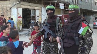 Members of Hamas armed wing parade in Gaza City [upl. by Adriano]