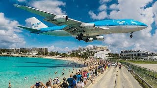 BOEING 747 low LANDING above THE BEACH  St Maarten and Maho Beach 4K [upl. by Ylrac536]