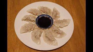 Pork Dumplings Chinese Jiaozi Recipe [upl. by Eimorej]