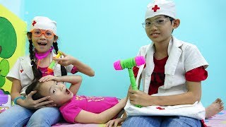 Kids doctor pretend play and healthcare for family at indoor playground  Nursery rhymes song babies [upl. by Kcirad230]